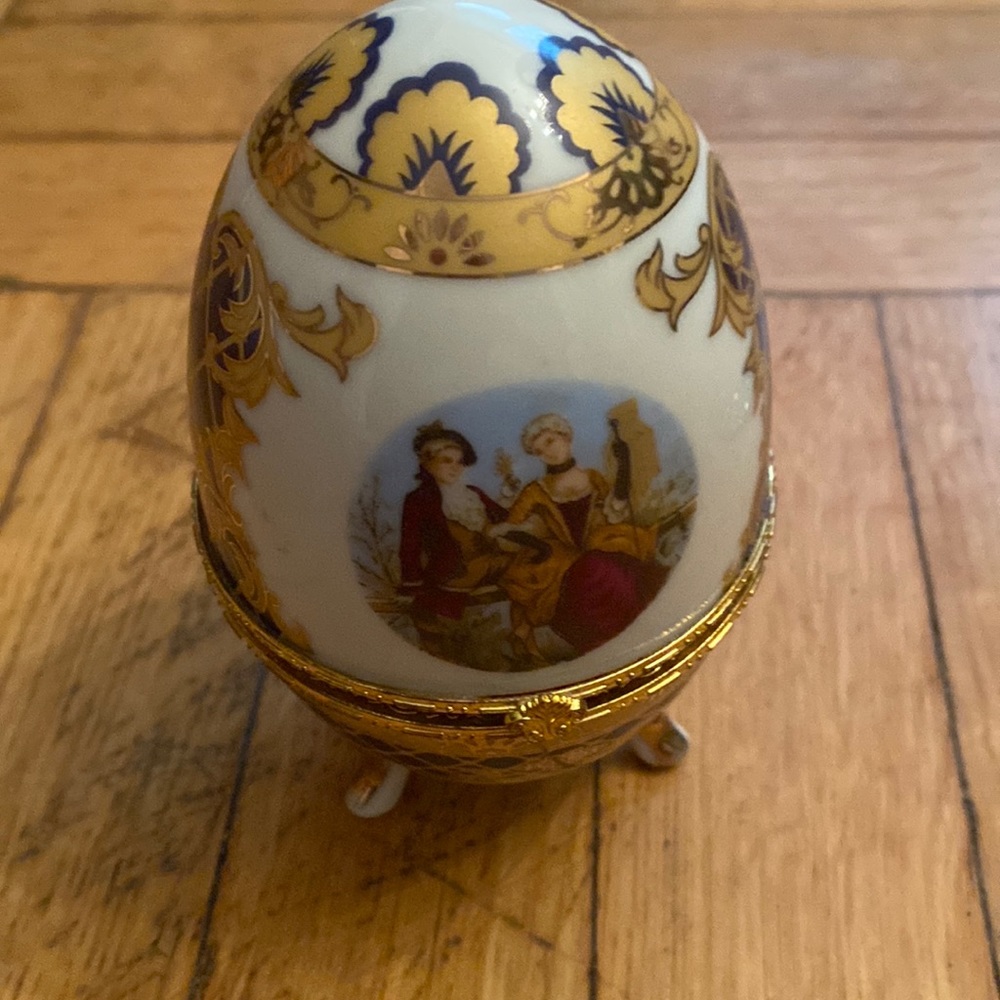 New  China egg. Holds jewelry or whatever you like!